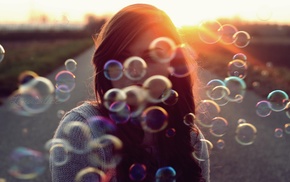 sunlight, bubbles, girl outdoors